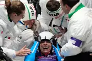 Golden Luge Victory: Italy's Emotional Olympic Triumph Captured in Photo