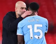 Guardiola's Kiss of Relief as City's Late Anfield Win Revives Title Hopes