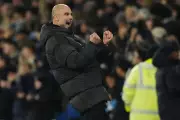 Guardiola's Manchester City Vow: 'Never Give Up' in Title Chase with Arsenal