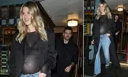Hannah Cooper Flaunts Baby Bump in Sheer Top at Agent Provocateur Dinner