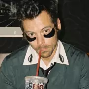 Harry Styles' Under-Eye Patches Spark Luxury Beauty Buzz