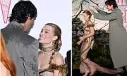 Jacob Elordi Shields Margot Robbie from Rain at Wuthering Heights Premiere