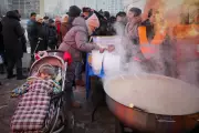 Kyiv Mother's Struggle: Keeping Children Warm Amid Winter Power Cuts