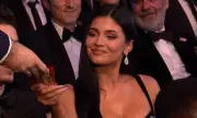 Kylie Jenner Puzzled by British Snacks at BAFTAs as Alan Cumming Hosts