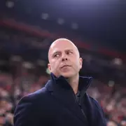 Liverpool's Quiet Transfer Window: Slot and Hughes Defend Strategy Amid Criticism