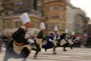 Londoners in Costume Sprint in Frying Pan Race on Pancake Day