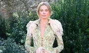 Margot Robbie Stuns in Period Style Coat at London Wuthering Heights Photocall