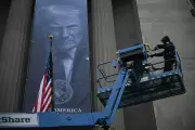Massive Trump Banner on DOJ Building Sparks Authoritarian Comparisons
