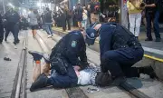Sydney Protester Accused of Biting Officer After Viral Police Assault Video