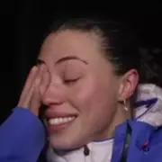 Team GB's Stoecker Overcome with Emotion After Historic Skeleton Gold at Winter Olympics