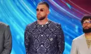 Travis Kelce's Bold Snakeskin Outfit Steals NFL Honors Spotlight