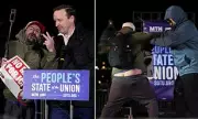Trump Supporter Storms Stage at Democrats' 'People's State of the Union' Protest