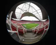 Wigan Face Arsenal in FA Cup Amidst Relegation Battle and Historic Echoes