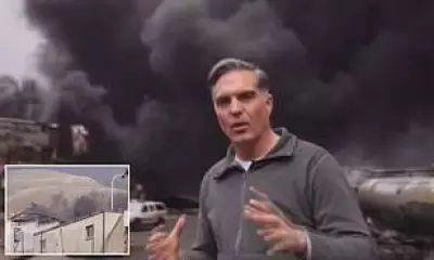 CNN Reporter Broadcasts from Bombed Iranian Oil Depot Amid Toxic Smoke