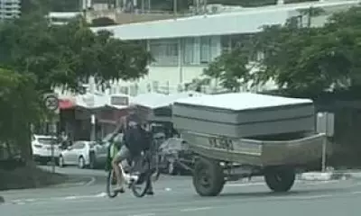 Gold Coast Viral Video: Lime Bike Rider Tows Stolen Boat, Creates Illegal Beach Camp
