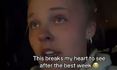 JoJo Siwa Tears Up as Chris Hughes Returns to UK, Says 'It Never Gets Easier'