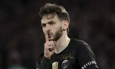 Kvaratskhelia Commits to PSG Amid Arsenal Transfer Speculation