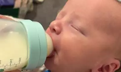 Mother's Guilt After Newborn's Agony from Recalled Baby Formula Toxins