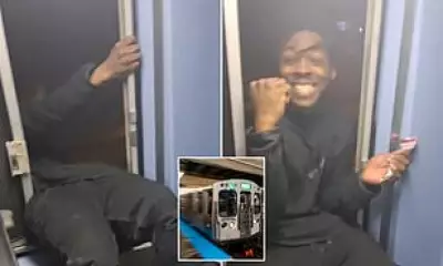 Reckless Chicago Commuter Films Himself Hanging from Speeding Train Window