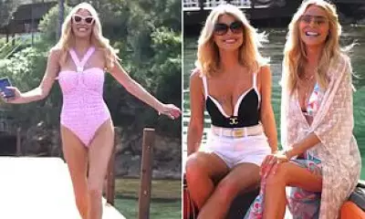 Tess Daly Stuns in Pink Swimsuit for Naia Beach Photoshoot in Turkey