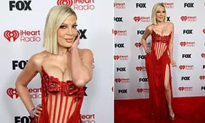 Tori Spelling Stuns in Red Gown at iHeartRadio Awards Amid Surgery Comments