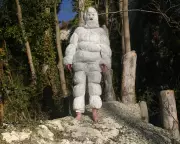 Artist's Nappy Costume Performance Highlights Sewage Crisis and Personal Struggle