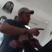 Baby Killer Dad Argues With Police Over Handcuffs During Arrest For Daughter's Murder