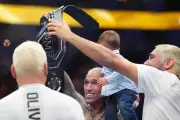 Charles Oliveira Dominates Max Holloway to Claim UFC BMF Championship