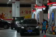Chinese Motorists Queue at Pumps as Government Caps Record Fuel Price Hike