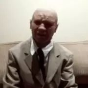 Elderly Man Claims CIA Time Travel to 2118, Presents Blurry Photo as Evidence