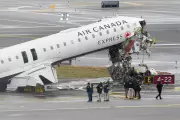 Flight Attendant Survives Being Thrown from Air Canada Plane in LaGuardia Crash