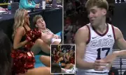 Gonzaga Basketball Star Goes Viral After Landing in Cheerleader's Lap During Game