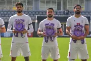 Iran Football Team's Silent Protest with Schoolbags and Armbands