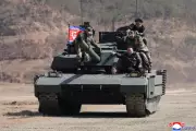 Kim Jong Un's Daughter Drives Anti-Drone Tank in North Korean Military Drill