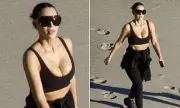 Kim Kardashian Flaunts Toned Figure in SKIMS Beach Outfit Ahead of Nike Collaboration