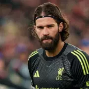 Liverpool's Alisson Faces Fitness Race for PSG Clash After Brighton Defeat