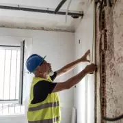 Man Discovers Hidden Safe Behind Kitchen Tiles, Finds Cash and iPhone