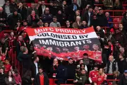 Manchester United Fans Display 'Proudly Colonised by Immigrants' Banner