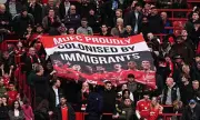 Manchester United Fans Protest Ratcliffe's Immigration Remarks with Banner