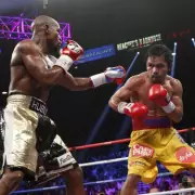 Mayweather Contradicts Pacquiao Rematch Rules, Labels Bout an Exhibition