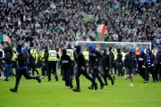 Old Firm Pitch Invasion Sparks Outrage and Calls for Fan Bans