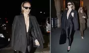 Olivia Wilde Stuns in Plunging Catsuit at Paris Fashion Week