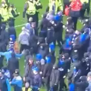 Pitch Invasion and Clashes Mar Old Firm Scottish Cup Penalty Drama