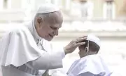 Pope's Mini-Me Moment: Adorable Baby Dressed as Pontiff Blessed in Vatican