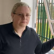 Residents Feel Imprisoned by Mystery Fence Erected Outside Windows