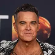 Robbie Williams Parts Ways With Management Team After 14 Years