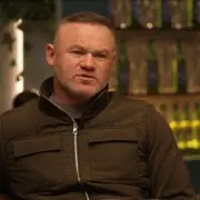 Rooney and Neville Clash Over Carrick's Manchester United Future