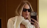 Rosie Huntington-Whiteley Stuns at Paris Fashion Week with Chic White Suit