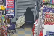 Shopkeeper's Quick Thinking Traps Armed Robber Inside Coventry Store