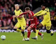 Tottenham's Fighting Spirit Shines in Draw Against Liverpool at Anfield